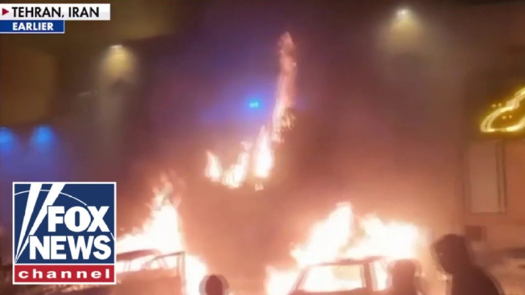 Protesters set Tehran ABLAZE